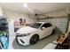 This spacious garage offers ample room for parking and storage at 1430 Tern Ct, Poinciana, FL 34759