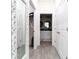Hallway leads to the bathroom and walk-in closet, creating a seamless flow within the home at 1430 Tern Ct, Poinciana, FL 34759