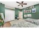 Spacious ' bedroom with a large closet and cheerful decor, offering ample storage and room to play at 1610 Sherwood Lakes Blvd, Lakeland, FL 33809