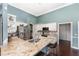 Modern kitchen with granite countertops, stainless steel appliances, and bar seating at 1610 Sherwood Lakes Blvd, Lakeland, FL 33809