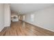 Spacious living room with natural light and open access to the kitchen area at 4011 Gardenia Ave, Lake Hamilton, FL 33851