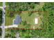 Aerial view of the property showing the home, large lot, and surrounding landscape at 5080 Maple Dr, Lakeland, FL 33810