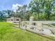 Enclosed utility area near outbuilding, complete with water storage and filtration system for self sufficiency at 5080 Maple Dr, Lakeland, FL 33810