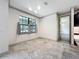 Bright dining room area featuring natural light, marble floors, and neutral color palette at 5080 Maple Dr, Lakeland, FL 33810