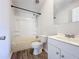 This bathroom features a shower/tub combo and single sink vanity at 5268 Rock Dove Loop, Lakeland, FL 33810