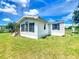 Exterior view of a single-story home showing the front and lawn at 5268 Rock Dove Loop, Lakeland, FL 33810