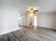 Bright living room featuring sleek flooring, a ceiling fan, and neutral wall colors at 5268 Rock Dove Loop, Lakeland, FL 33810