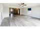 Bright living area featuring attractive flooring, neutral decor, and open layout at 5268 Rock Dove Loop, Lakeland, FL 33810