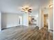Inviting living room showcasing sleek flooring, recessed lights, and a ceiling fan at 5268 Rock Dove Loop, Lakeland, FL 33810