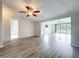Stylish living room boasts sleek flooring and an abundance of natural light at 5268 Rock Dove Loop, Lakeland, FL 33810