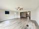 Spacious living room showcasing laminate floors, natural light, and an inviting atmosphere at 5268 Rock Dove Loop, Lakeland, FL 33810
