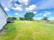 Wooden porch overlooking spacious yard at 5268 Rock Dove Loop, Lakeland, FL 33810