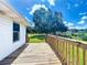 Wooden porch overlooking spacious yard at 5268 Rock Dove Loop, Lakeland, FL 33810