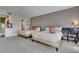 Bedroom features two queen beds, a desk, kitchenette, and has a view to a bathroom entrance at 6165 Carrier Dr # 1309, Orlando, FL 32819