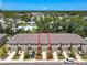 Aerial view of townhomes, showcasing the property and surrounding landscape at 67 Bella Oaks Dr, Port Orange, FL 32129