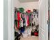 Organized walk-in closet with ample storage for clothing, shoes, and accessories at 67 Bella Oaks Dr, Port Orange, FL 32129