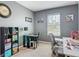 Well-lit home office with desk space, shelving, and cozy decor for work or study at 67 Bella Oaks Dr, Port Orange, FL 32129