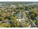 Overhead view of the home at 1616 Huntington St in a scenic neighborhood near a lake at 1616 Huntington St, Lakeland, FL 33801