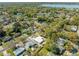 An aerial shot of the property, surrounded by lush trees and neighborhood streets at 1616 Huntington St, Lakeland, FL 33801