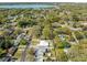 An aerial view showcasing the property in a beautiful neighborhood near a lake at 1616 Huntington St, Lakeland, FL 33801