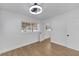 Bright bedroom featuring natural light, wood floors, and a neutral color scheme at 1616 Huntington St, Lakeland, FL 33801