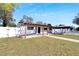 Charming single story home featuring covered parking and an inviting entrance at 1616 Huntington St, Lakeland, FL 33801