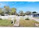 Charming single story home with an inviting walkway, and white picket fence at 1616 Huntington St, Lakeland, FL 33801
