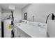 Well-lit laundry area with modern washer and dryer at 1616 Huntington St, Lakeland, FL 33801