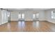 Bright living room with wood floors and double doors leading to the outside at 1616 Huntington St, Lakeland, FL 33801