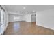 Open-concept living area with wood floors and plenty of natural light at 1616 Huntington St, Lakeland, FL 33801