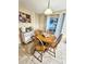 Dining area showcasing wooden table, four chairs, and natural light at 1841 Talmadge St, Deland, FL 32724