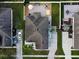 Aerial view of home showcasing the roof, patio, driveway, and surrounding yard at 2864 Running Brook Cir, Kissimmee, FL 34744