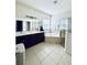 Spacious bathroom with dual sinks, separate shower, soaking tub, and modern fixtures at 2864 Running Brook Cir, Kissimmee, FL 34744