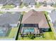 This house has a screened-in pool, patio, and lush landscaping enhancing its outdoor living space at 3249 Pearly Dr, Lakeland, FL 33812