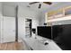 Bright bedroom featuring a desk area, a closet, and comfortable bunk beds at 3249 Pearly Dr, Lakeland, FL 33812