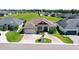 Stunning home showcasing lush landscaping and a beautiful circular driveway adding to its curb appeal at 3249 Pearly Dr, Lakeland, FL 33812