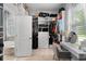 Walk-in closet with custom shelving, drawers, and a vanity area at 3249 Pearly Dr, Lakeland, FL 33812