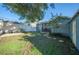 A cozy backyard with a patio, lush greenery, and a charming single-Gathering house at 549 Palencia Pl, Lakeland, FL 33803