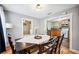 Welcoming dining area showcasing seamless access to the kitchen and living room, enhancing livability at 549 Palencia Pl, Lakeland, FL 33803