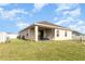 Spacious backyard with large, well-maintained lawn perfect for outdoor activities and relaxation at 887 Galloway St, Lake Alfred, FL 33850