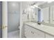 Bathroom with white cabinets and tile flooring, offering a clean and functional space at 446 Eagle Cir, Casselberry, FL 32707
