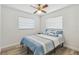 Well-lit bedroom with nautical themed bedding and light flooring, creating a cozy space at 446 Eagle Cir, Casselberry, FL 32707