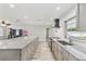Spacious kitchen features granite countertops, stainless steel appliances, and ample storage at 446 Eagle Cir, Casselberry, FL 32707