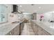 Modern kitchen with granite countertops, stainless steel appliances, and an open layout at 446 Eagle Cir, Casselberry, FL 32707