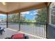 Enjoy the scenery on the screened-in balcony overlooking the tennis court at 886 Suffolk Pl, Davenport, FL 33896
