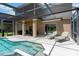 Enjoy this gorgeous screened in pool with a connected spa and plenty of room for entertaining at 886 Suffolk Pl, Davenport, FL 33896