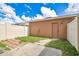 Enclosed backyard with privacy fence, some green space, and back door access to the home at 12975 Calderdale Ave, Windermere, FL 34786