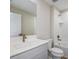 Bright bathroom with a combination tub and shower, large mirror, and neutral color palette at 9619 Sw 62Nd Ct, Ocala, FL 34476