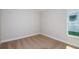 Cozy bedroom with a window providing natural light and neutral colored carpet at 9619 Sw 62Nd Ct, Ocala, FL 34476