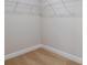 Compact walk-in closet with shelving for optimal organization and storage at 9619 Sw 62Nd Ct, Ocala, FL 34476